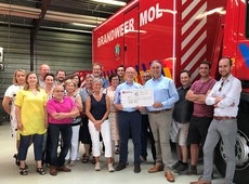 overhandiging cheque Help Brandwonden Kids